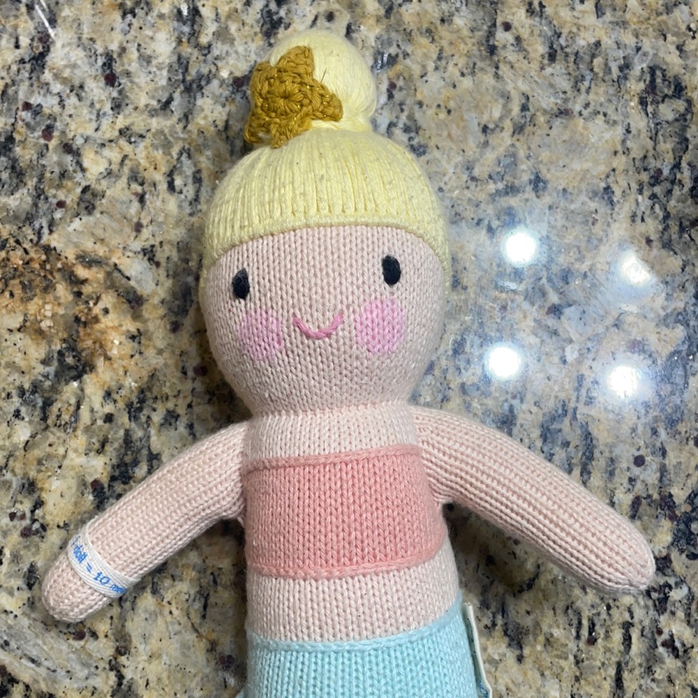 Cuddle and kind small mermaid